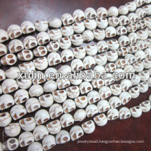 cheapest wholesale turquoise white powder synthetic howlite skull beads